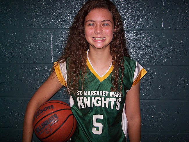 Photo: Courtesy of St. Margaret Mary - Meet Regan Staudt, a star athlete at St. Margaret Mary. When she's not shooting hoops, she's taking shots at the goal or running hard to the finish line.