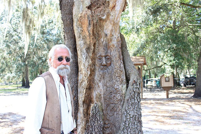 Photo by: Marimar Toledo - David McCallum brings the trees in Lake Baldwin Park to life with his intricate carvings.