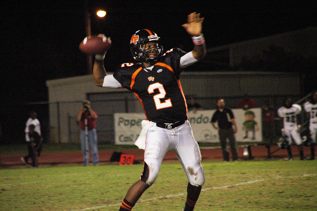 Photo by: Isaac Babcock - Winter Park High School quarterback Asiantii Woulard has a final shot at erasing memories of last season's untimely end.