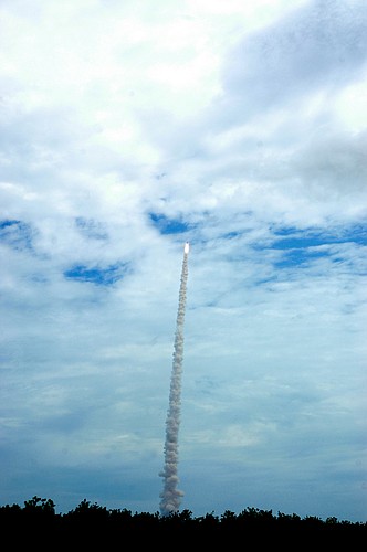 Photo by: Isaac Babcock - Atlantis hurtles toward a deck of clouds during the last launch of the Space Shuttle program, July 8.