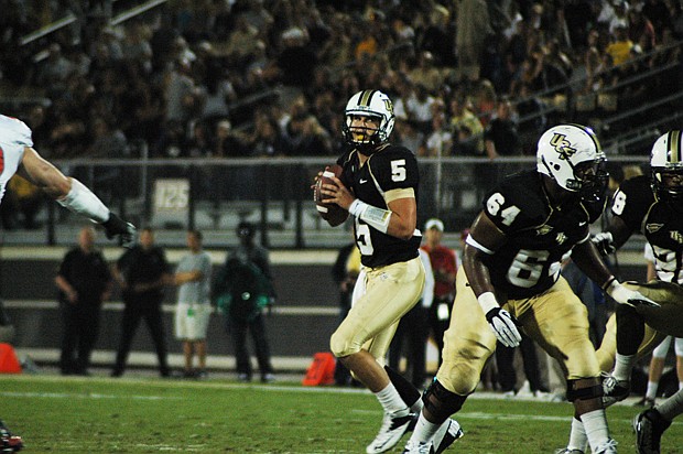 Photo by: Isaac Babcock - UCF quarterback Blake Bortles totaled 352 yards in the Knights' rout of Ball State in the Beef O'Brady's Bowl.