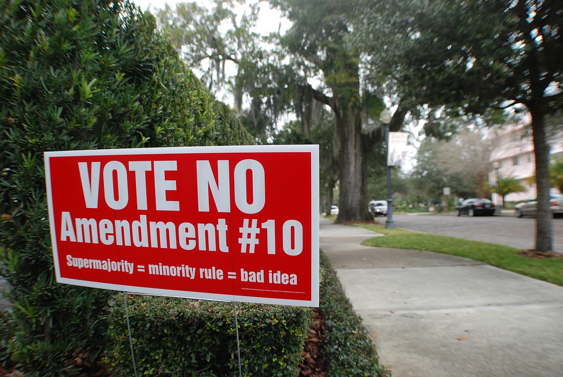 Photo by: Abraham Aboraya - A campaign sign against the controversial Amendment 10 is on display on a Winter Park street before the March 9 election. The amendment did not pass, but a similar ordinance was upheld by the Commission.