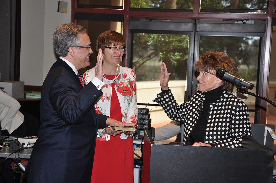 Photo by: City of Winter Park - Winter Park Mayor Ken Bradley takes his second oath of office Feb. 13 after winning his bid for re-election.