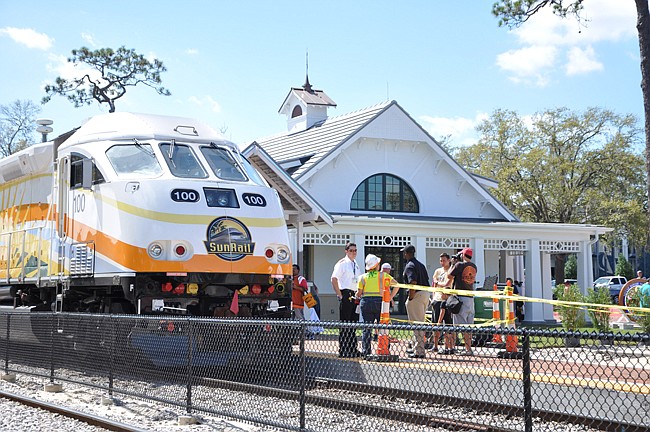 Photo by: Tim Freed - A SunRail train arrives at Winter Park's new station during an event held March 3.