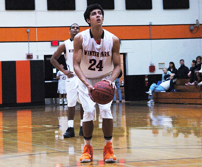 Photo by: Isaac Babcock - Winter Park High School basketball player Jay Wimbley leads the Wildcats team in scoring this year.
