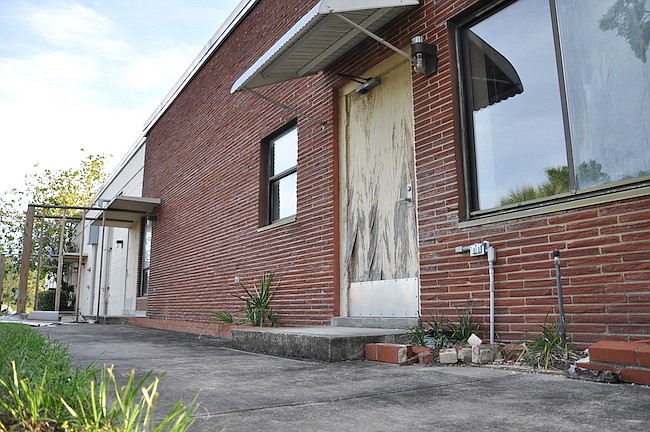 Photo by: Tim Freed - A property that has sat abandoned for years may see unusual measures taken to help it sell, including wiping a street off the map.