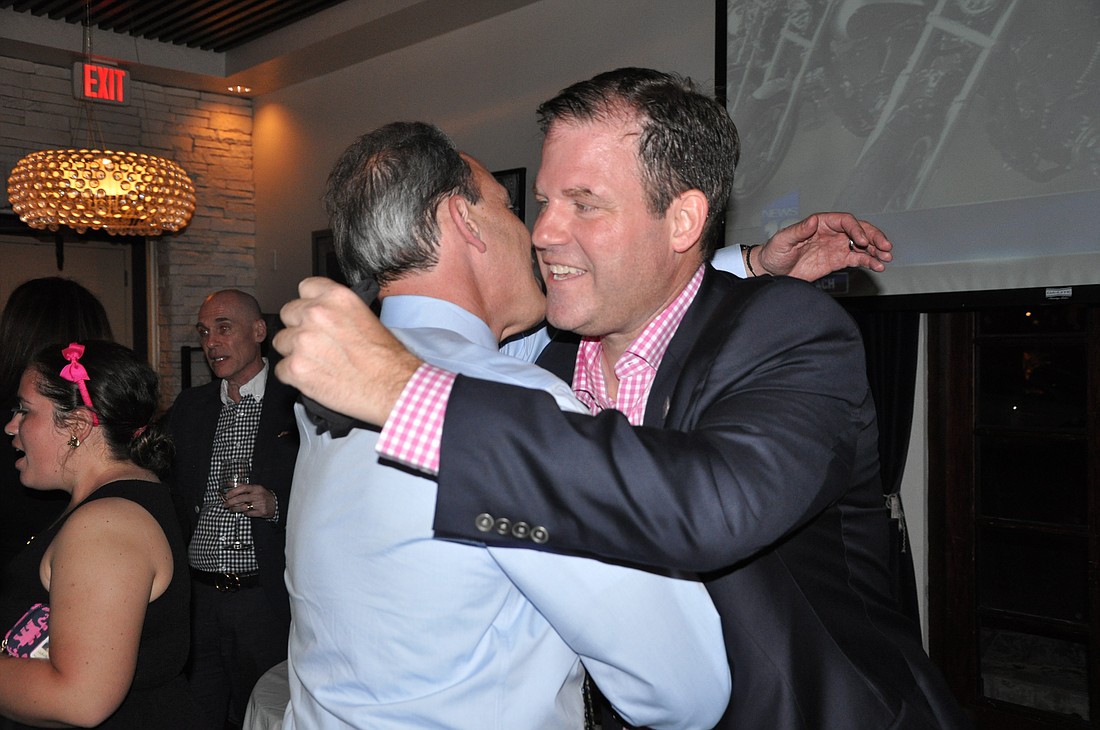 Photo by: Tim Freed - Steven Leary celebrates winning a Winter Park mayoral seat Tuesday.