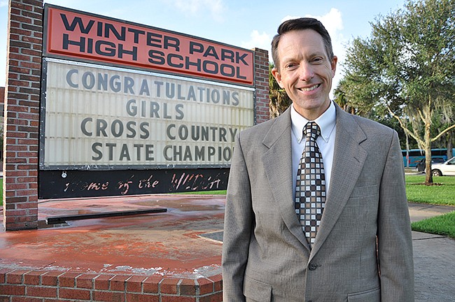 Photo by: Tim Freed - Tim Smith has helped build a school with top-quality arts and music programs, earning Secondary Administrator of the Year for it.