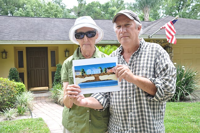 Photo by: Tim Freed - Jeff Nancarvis and his mother Pauline France are living on top of a sinkhole in Maitland.