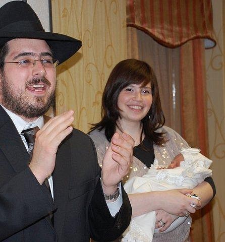 Rabbi Majesky presided over an extra-special naming ceremony, one on behalf of his third daughter, just 5 days old, as she blissfully slept in her mother's arms during the entire service.