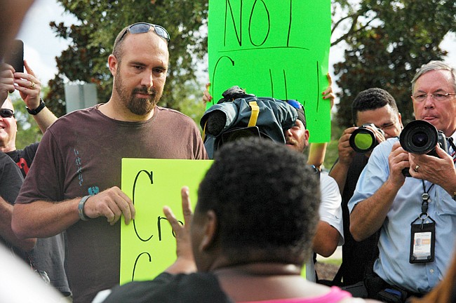 Photo by: Isaac Babcock - Protestors may have another thing to protest in Winter Park: Attacks on the right to protest.