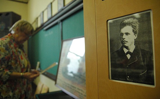 Photo by: Isaac Babcock - Magnus Backlund, an ancestor of teacher Karen Jacobs, stares back at students during a class on writing family history at the Public History Center.