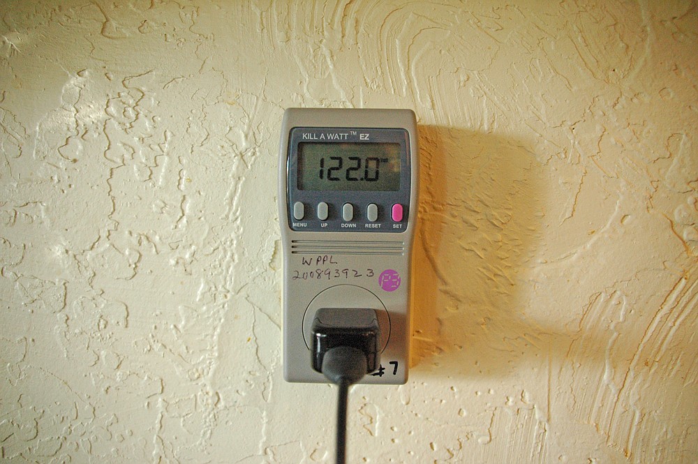 Photo by: Isaac Babcock - An energy monitor checkout service at the Winter Park Library lets users check how much energy their electrical devices use in their home, and calculates how much they cost to run.