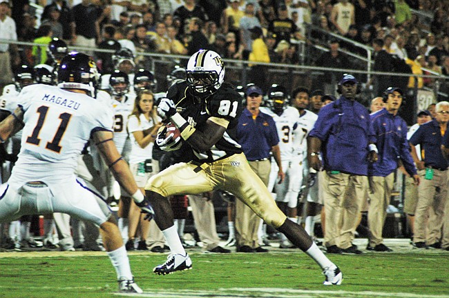 Photo by: Isaac Babcock - Freshman receiver Breshad Perriman evades defenders during UCF's 40-20 win over East Carolina Oct. 4.