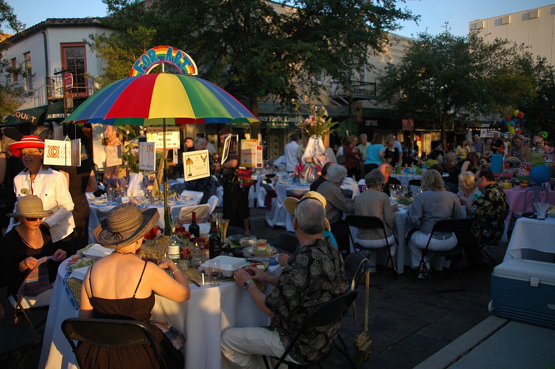 Photo by: Isaac Babcock - The Winter Park City Commission gave the go ahead for a trail run of on-street dining in Hannibal Square, but held back on deciding whether to regulate sidewalk performers.