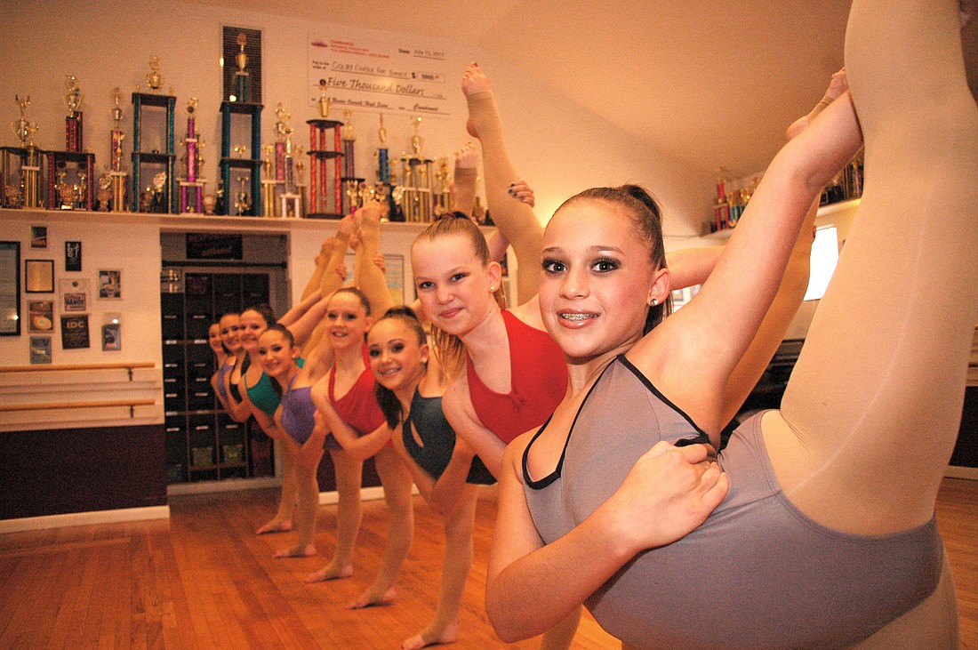 Photo by: Isaac Babcock - Dancers show off some moves at the Colby Dance Studio in Maitland.