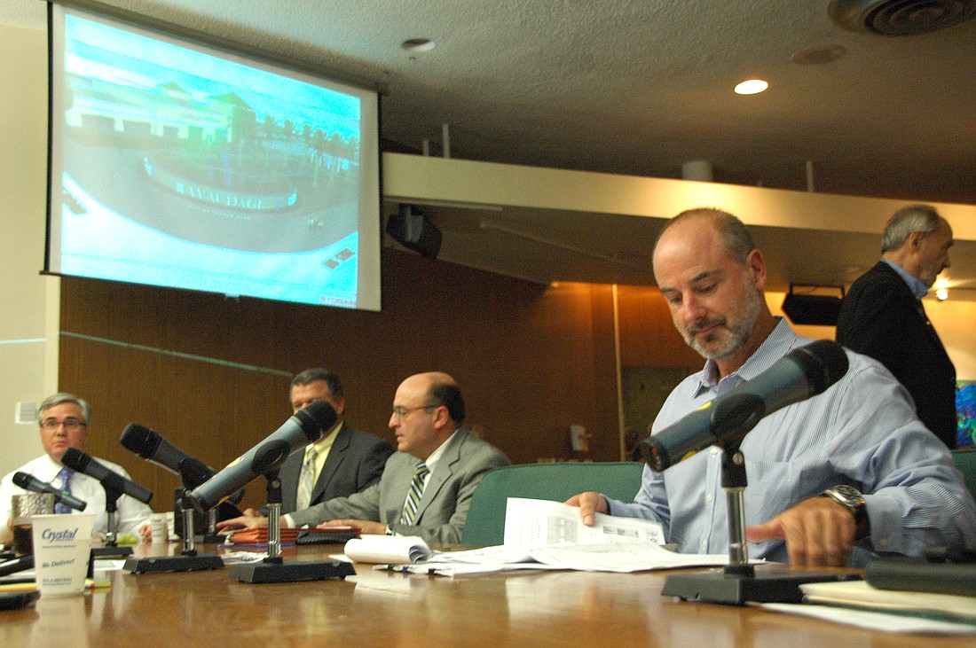 Photo by: Isaac Babcock - Developer Dan Bellows, right, discussed new plans for the Ravaudage project at the Winter Park City Commission meeting Aug. 22.