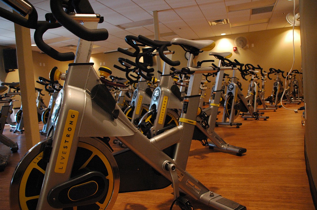 Photo by: Isaac Babcock - The Winter Park YMCA counts 10 more spinning bikes among its recent expansion.