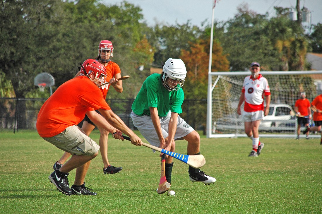 Photo by: Isaac Babcock - Hurlers play a scrimmage on a field in Winter Park's Lake Island Park, which will be renamed Martin Luther King, Jr. Park in honor of the civil rights leader.