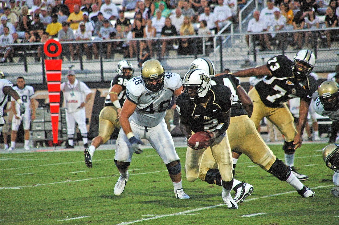 Photo by: Isaac Babcock - Jeff Godfrey led the Knights to a season-opening blowout over Charleston Southern 62-0