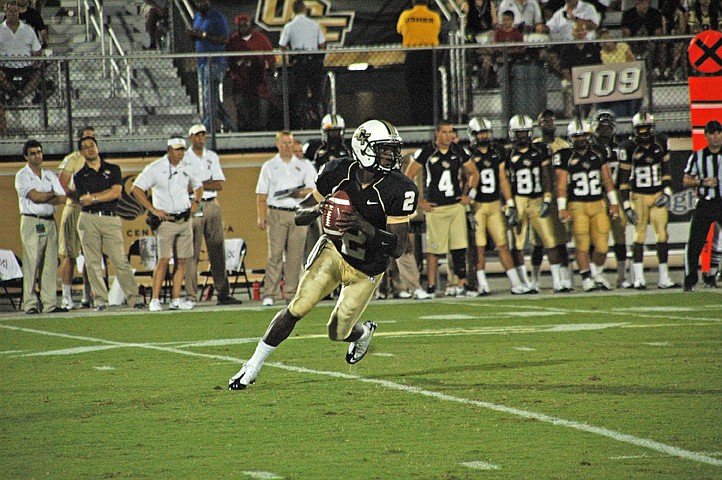 Photo by: Isaac Babcock - Knights quarterback Jeff Godfrey had trouble staying away from defenders against FIU, being sacked six times in the game. He'll look to regain some offensive firepower against BYU Sept. 23.