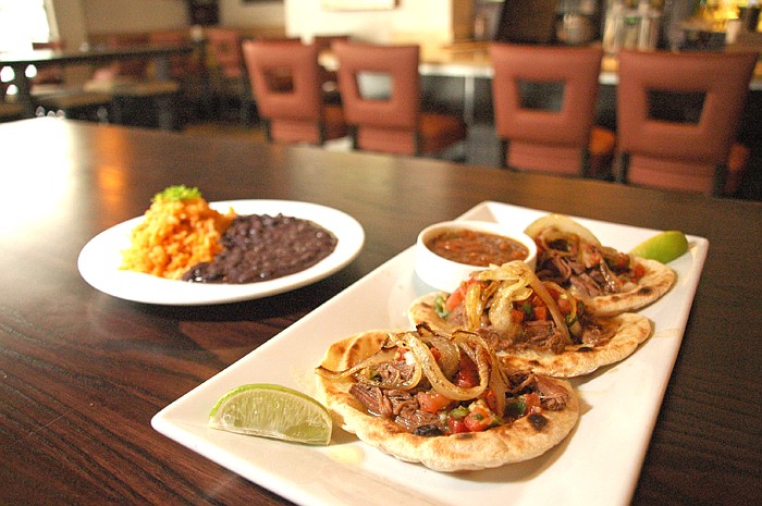 Photo by: Isaac Babcock - Observer food critic Josh Garrick raved about the beef brisket tacos at Cocina 214.
