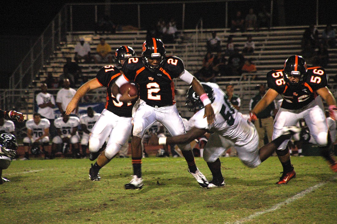 Photo by: Isaac Babcock - Winter Park's Asiantii Woulard lit up Evans for nearly 300 yards in the air, but couldn't overcome a big first half deficit.
