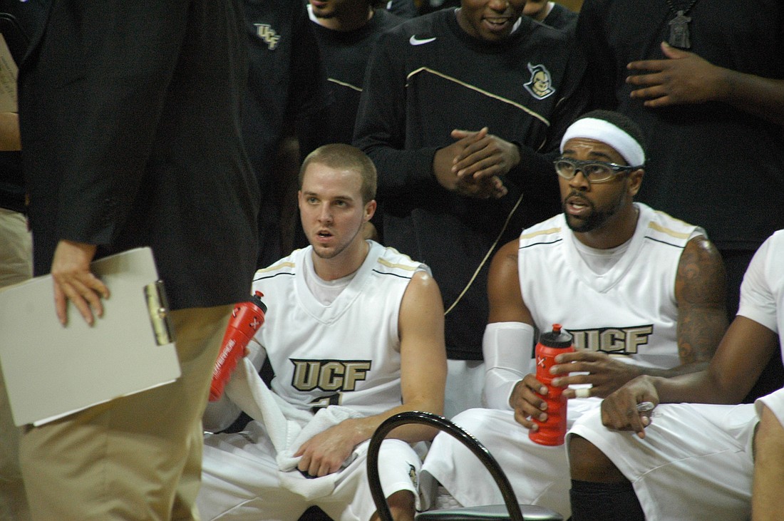 Photo by: Isaac Babcock - A.J. Rompza (left) and Marcus Jordan sit on the sideline.  They lost their second game of the year against Southern Miss.