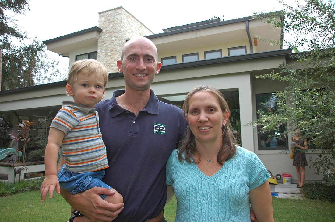 Photo by: Isaac Babcock - Rob and Denise Smith, with son Elliott, designed Central Florida's first LEED certified home, and they've been living in it ever since.