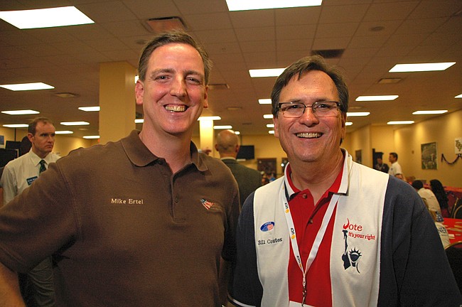 Photo by: Isaac Babcock - Seminole County Supervisor of Elections Mike Ertel and Orange County Supervisor of Elections Bill Cowles pose at the East Side Regional Hob Nob June 26.