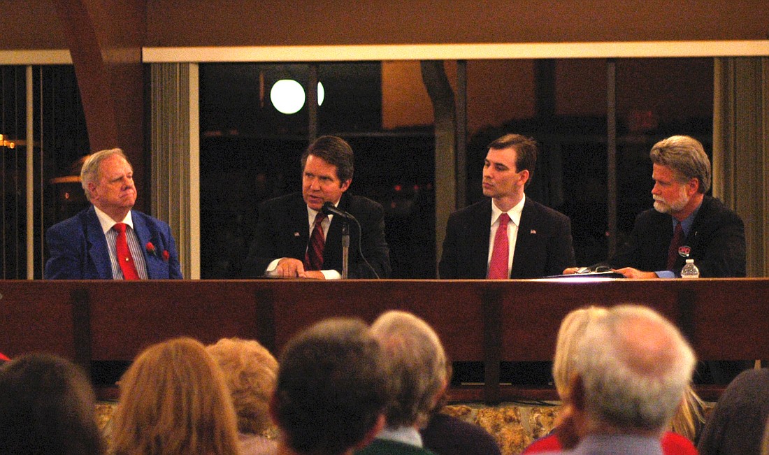 Photo by: Isaac Babcock - Maitland mayoral candidates Doug Kinson (left of center), John Yanchunis (right of center) and incumbent Mayor Howard Schieferdecker (right) squared off at a three-hour candidate forum Jan. 11.