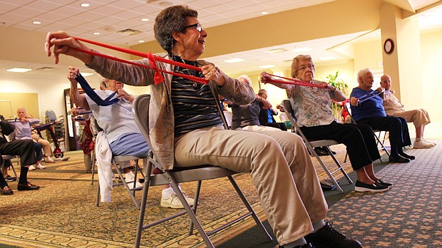 Photo by: Sarah Wilson - Seniors are pushing their limits at a new class at the Mayflower, which takes well-seasoned sitters and gets them moving again.