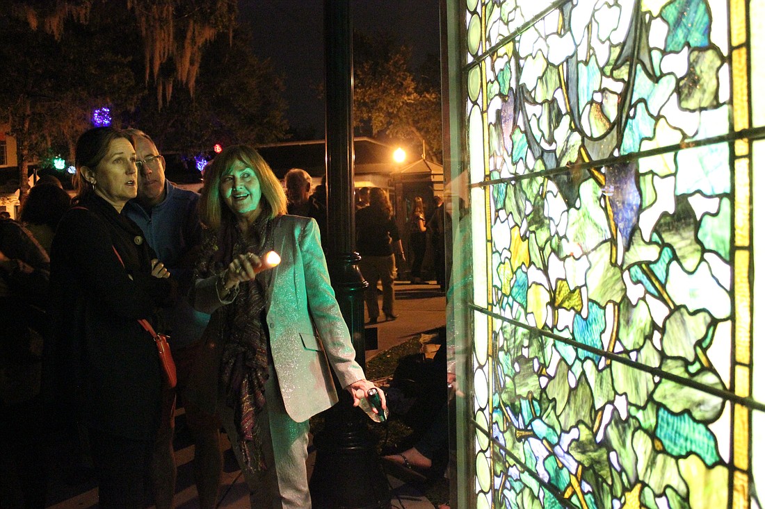 Photo by: Tim Freed - Christmas in the Park brings Tiffany windows from the Morse Museum out into Winter Park's Central Park.