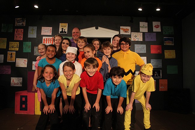 Photo by: Rebecca Males - Young actors at the Breakthrough Theatre pose with founder Wade Hair.