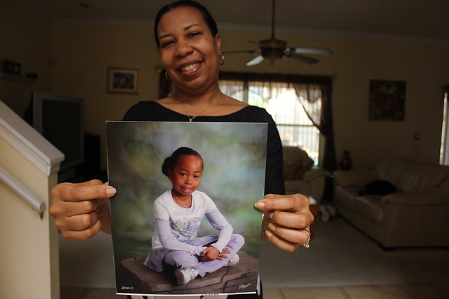 Photo by: Sarah Wilson - Rollins student Chiquita Wright launched a charity to fight the disease that took daughter Chanell.