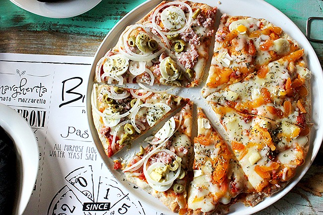 Photo by: Sarah Wilson - Braccia's Brazilian-style pizza is more like a pastry, with its savory and sweet assortment of toppings and thin flaky crust.