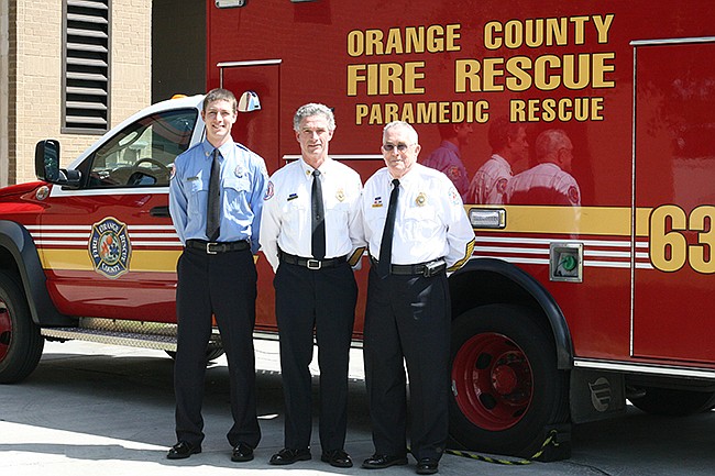 Photo by: Allison Olcsvay - For 56 years the Howell family, from left, Matthew, father Michael and grandfather Walter have rescued Orange County residents as firefighters.
