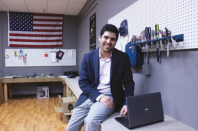 Photo by: Sarah Wilson - Karel Felipe started by tinkering with computers in his garage at home. Now Lotus Computers is selling nationwide, with handmade production that he says can put together 50 computers in two days.