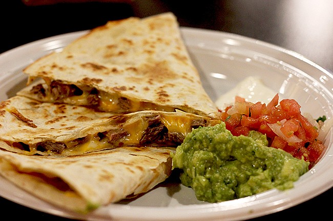 Photo by: Sarah Wilson - The steak quesadilla, pictured, and roast pork burrito impressed on a menu complete with customizable options.
