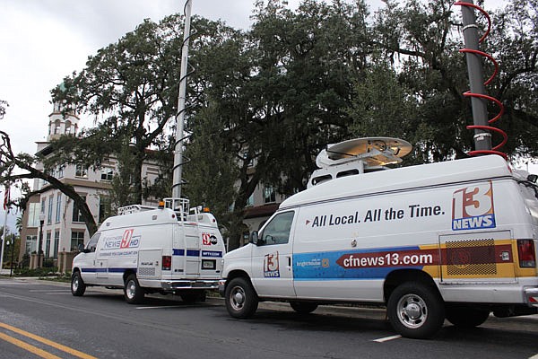 Photo by: Sarah Wilson - News media swarmed Maitland City Hall before Monday's meeting to speak to Councilman Phil Bonus, who had taken the day off.
