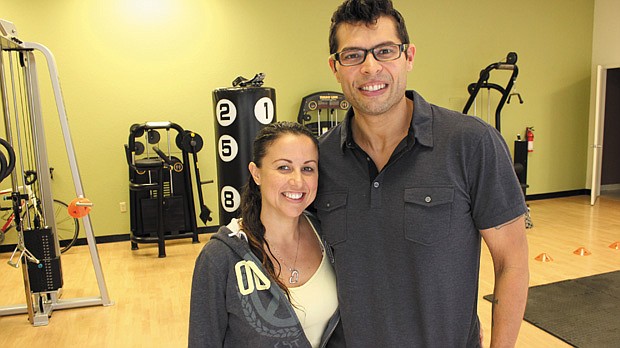 Photo by: Sarah Wilson - John Manjarres and fiancee Eileen Diaz at 180 Degree Fitness, started by Mangarres after he lost 80 pounds and began living a healthy lifestyle. Now he trains others in Baldwin Park.