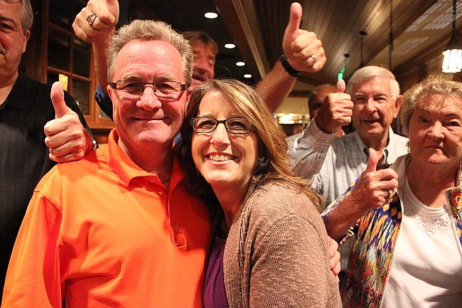 Photo by: Sarah Wilson - Dale McDonald and his wife celebrate his win in the Maitland mayoral election at Sam Snead's on March 10.