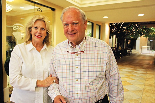 Photo by: Sarah Wilson - Sonja and Tony Nicholson, near their Park Avenue office, have turned a lifetime of success into a tradition of giving. The couple has donated millions to the community to help build school buildings and a surgical training center.