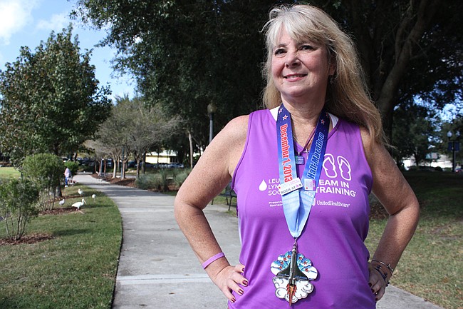 Photo by: Sarah Wilson - Jo Ann Donaldson went from wheelchair-bound to walking her first half-marathon earlier this month.