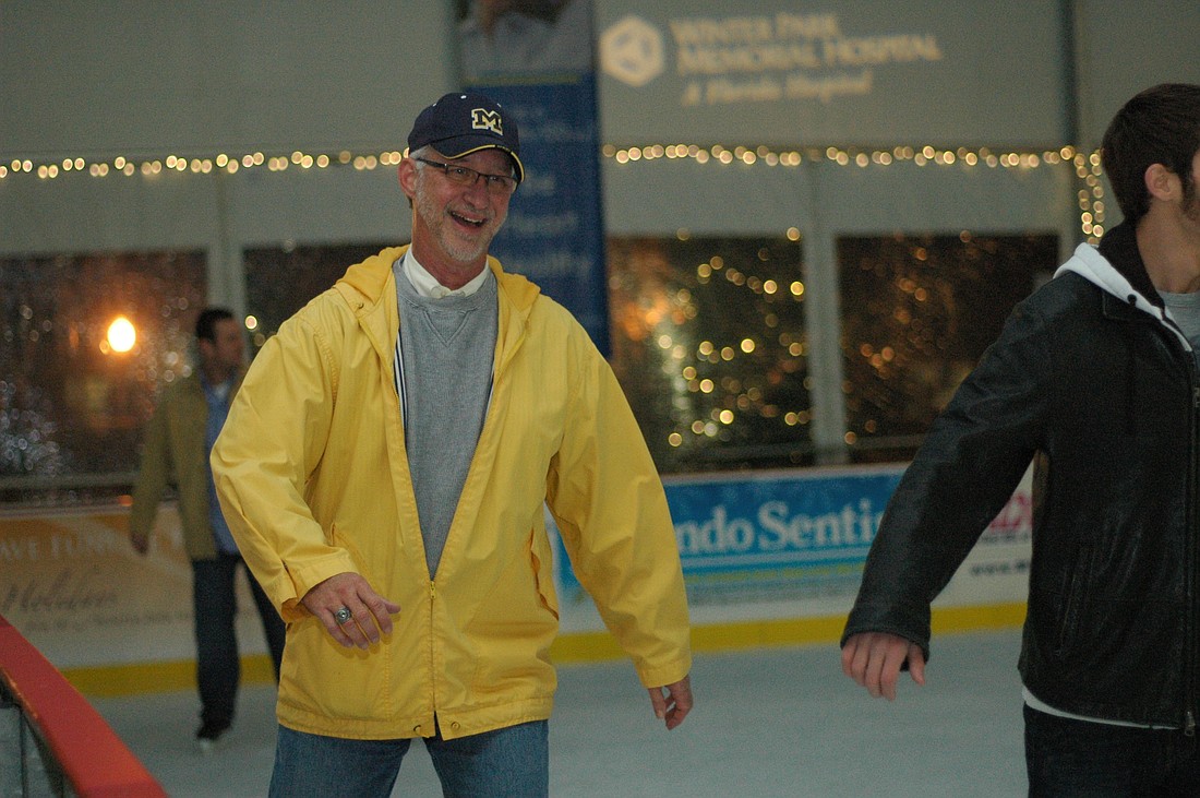Photo by: Isaac Babcock - Winter Park Commissioners Tom McMacken tried out his skills on ice at the Winter in the Park rink in the West Meadow of Central Park on Dec. 9.