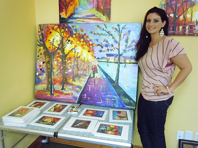 Photo by: Clyde Moore - Jessilyn Park shows off her work inspired by her grandmother.
