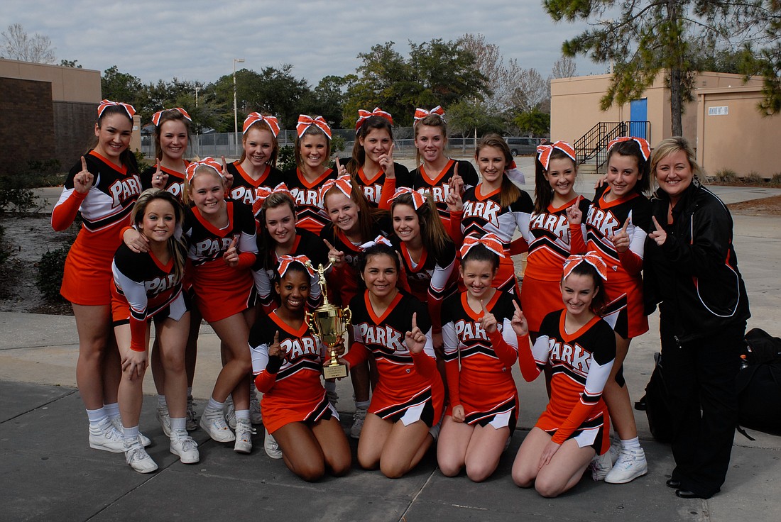 Photo courtesy of Winter Park High School - The Wildcats and Coach Angela Ryan celebrate after winning the Orange County Metro Cheerleading competition on Jan. 15.