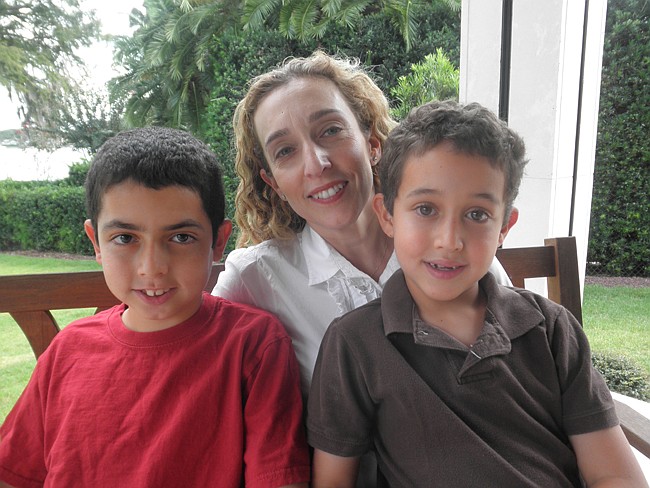 Photo by: Brittni Larson - Hali Poteshman, a developer of the Upstander program with the Holocaust Center, at her home in Winter Park with her sons Matthew and Sam Poteshman.