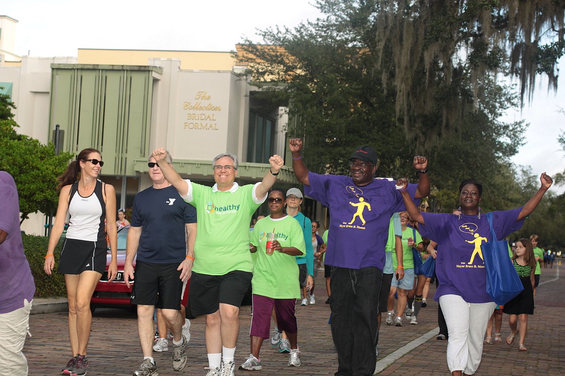 Photo by: Sarah Wilson - Winter Park, Maitland and Eatonville's mayors pump up the crowd at last year's Mayors' Sole Challenge.