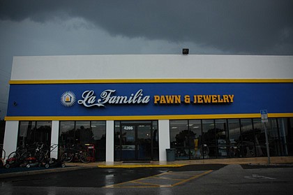 Photo by: Isaac Babcock - La Familia Pawn Shops, based in Winter Park, is one of several pawnshop companies trying to shed the stereotypical pawnshop image.